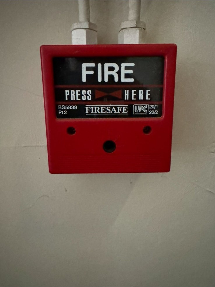 BS 5839 manual call point installed in an HMO escape route